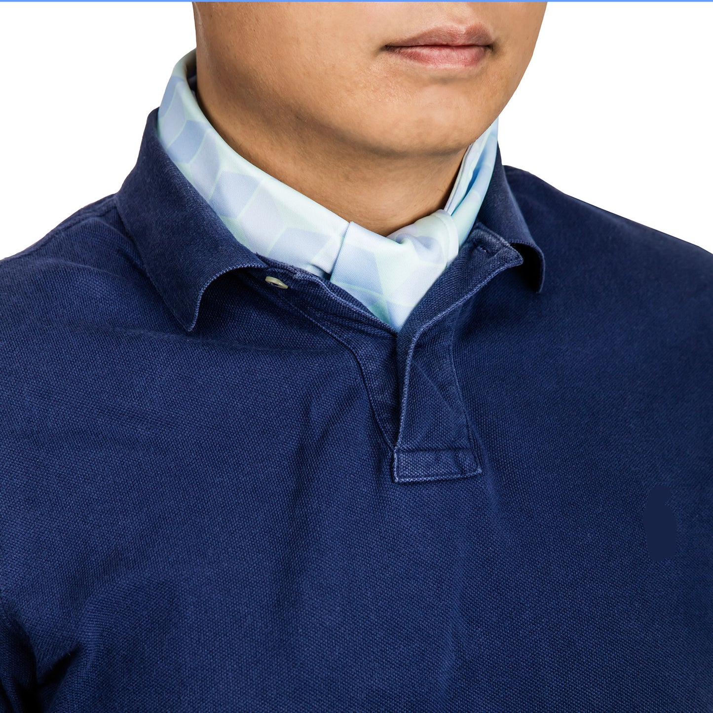Cooling neck scarf worn discretely under a polo shirt for hot-weather casual comfort