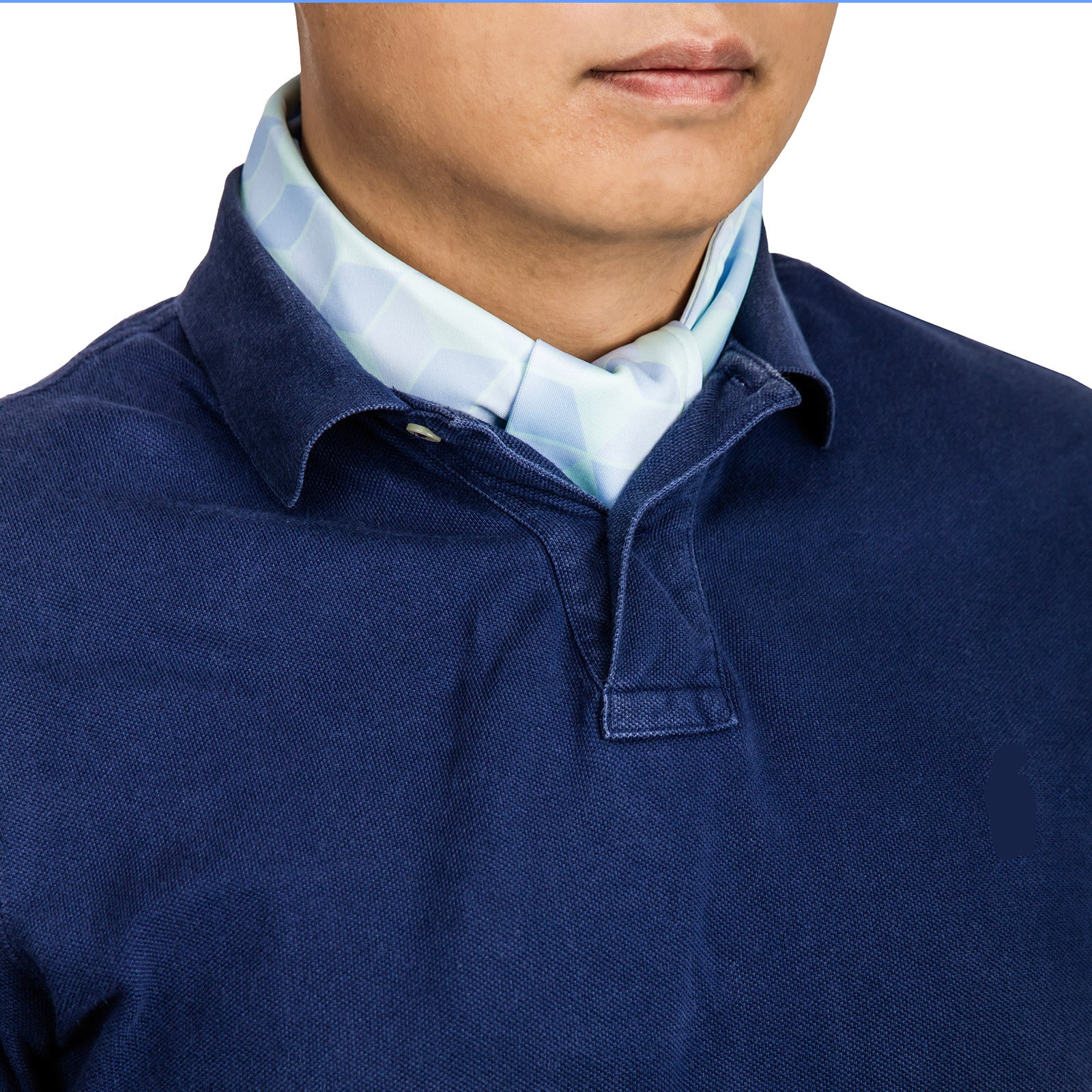 Cooling neck scarf worn discretely under a polo shirt for hot-weather casual comfort